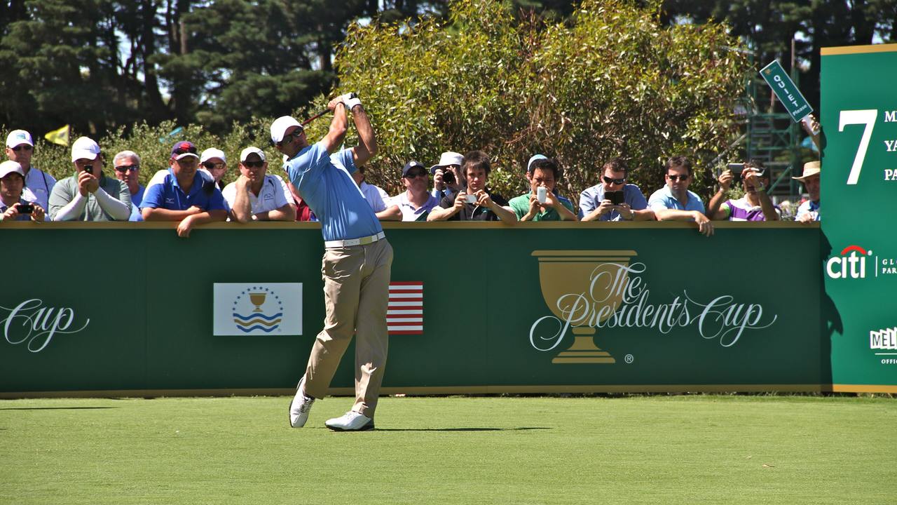 Adam Scott teeing off at the Presidents Cup